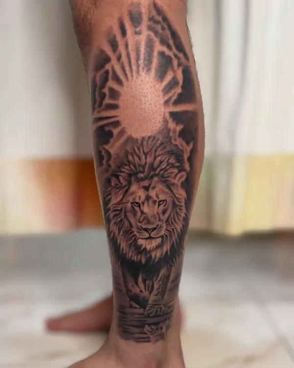 A majestic lion portrait on the calf, set against a rising sun. The detailed shading and powerful gaze capture the spirit of the "king of the jungle," symbolizing strength, courage, and leadership.