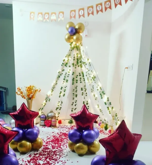 A full view of the cozy teepee tent birthday setup. It's a wonderful way to create a magical little world for a birthday celebration right in your living room.