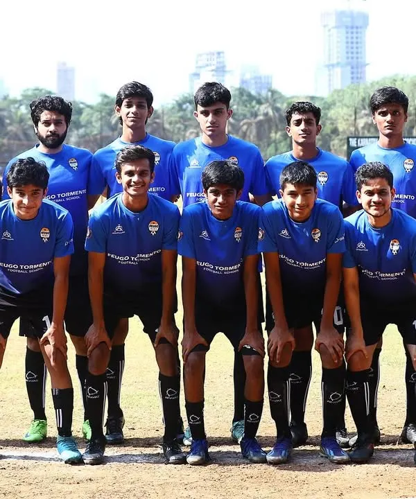 Our MFA Third Division team posing before a match. This squad is a mix of promising young talent and experienced players from our working professionals program.