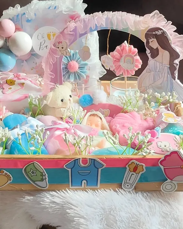 This is the kind of gift I love to create, a completely custom hamper to celebrate a new arrival. This one is packed with handmade soaps, lotions, candles, and keepsakes, all beautifully arranged in a decorated tray to welcome a precious baby.