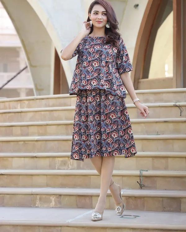 My Bagru hand-block printed co-ord set in a classic paisley design. The peplum top and tiered skirt create a flattering silhouette that can be dressed up with heels.