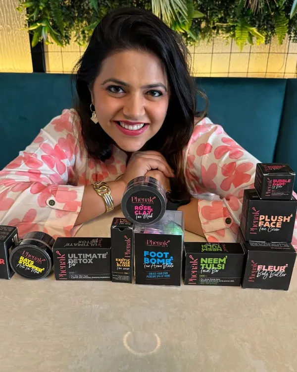 This is me, Priyanka, with the products I pour my heart into. I started Phenak to create skincare that feels personal and is rooted in the healing power of nature. I'm so excited to share my handcrafted creations with you.