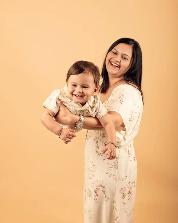(Hero Item) I love capturing the pure joy between a mother and child. This studio session was all about their natural laughter and connection, creating a timeless memory.