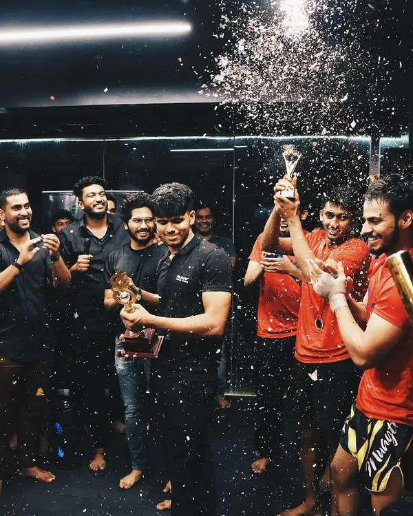 The moment of victory. Our fighters celebrate a win at the club wars, a testament to their hard work and dedication.