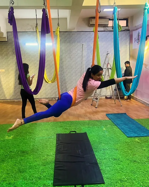 Welcome to a place where you can fly. I believe in finding freedom and strength by leaving the ground behind, and this is what that feeling looks like. This superman pose builds core and back strength while giving you an incredible sense of flight.