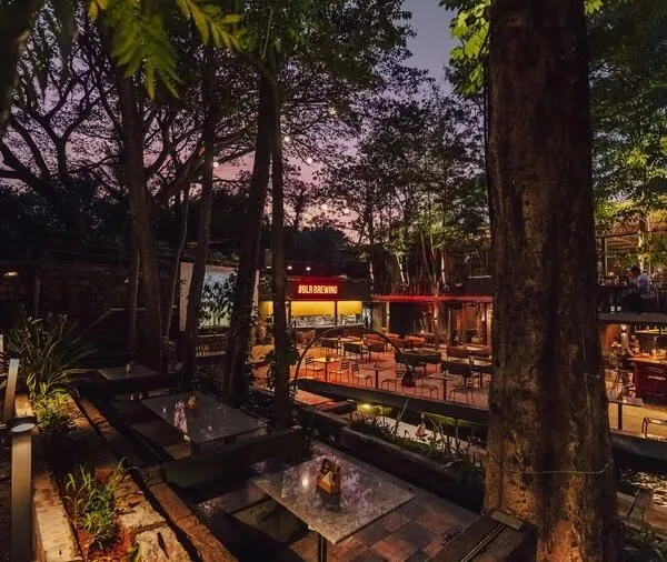 Our expansive brewpub and outdoor area is the ideal venue for large corporate parties like this New Year's Eve event, with multiple bars, a massive dance floor, and live food counters.