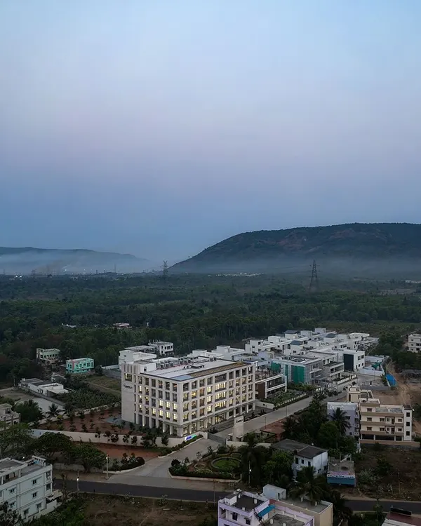 The Laurus Labs regional office in Vizag, designed to function with or without air conditioning. The facade and openable windows were key to achieving natural cross-ventilation, a core requirement from the client during the COVID era.
