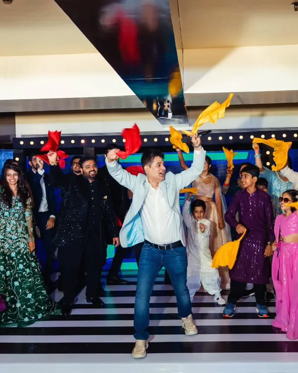 This is what I do best: turning a wedding into a full-blown celebration. I love jumping onto the dance floor and leading the charge, making sure every single guest, from friends to family, feels the energy and joins the fun.