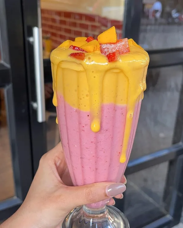For all the mango lovers, our seasonal mango and strawberry shake is a dream come true. It's thick, creamy, and topped with fresh fruit pieces.