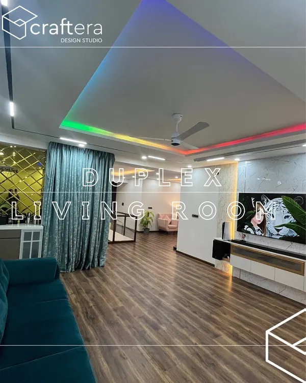 This is the living room of a duplex home I designed, featuring a spacious layout with modern furniture. I used recessed ceiling lights with customizable RGB colors to set different moods, from vibrant for parties to warm for quiet evenings.