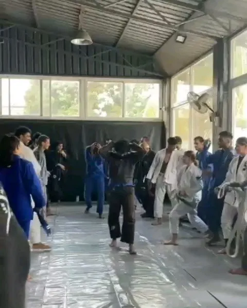 A candid shot from my Blue Belt grading ceremony at the Institute of Jiu-Jitsu. This was a significant milestone, earned through consistent training and dedication.