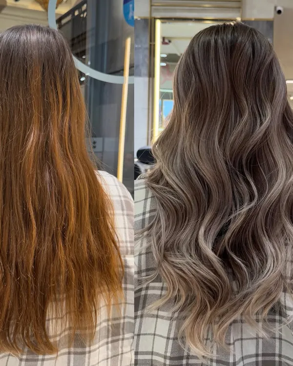 This is the power of a proper color correction. I took this hair from brassy and uneven to a seamless, creamy vanilla blonde balayage. The key was to gently lift the old color and then tone with a custom Redken formula to neutralize all unwanted warmth, creating this soft, luxurious finish.