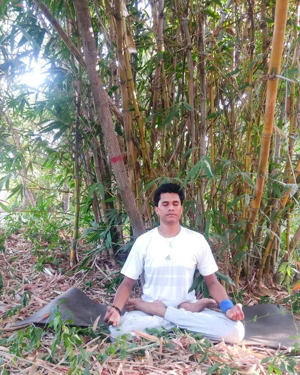 In the stillness of nature, surrounded by the quiet strength of bamboo, we find our own center. I believe true yoga begins when we learn to sit with ourselves. This is Padmasana, the Lotus Pose, a foundational posture for meditation that helps quiet the mind and connect with the spirit.