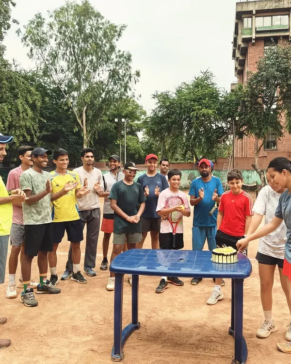 It's not all about the grind. We love celebrating our players' milestones together, like this birthday celebration on the court. We are a family.
