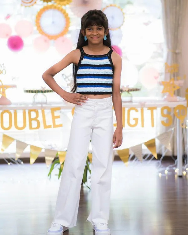 One of my favorite client photos. She’s celebrating her birthday in a custom-fit striped halter neck top. I love making special pieces for special days.