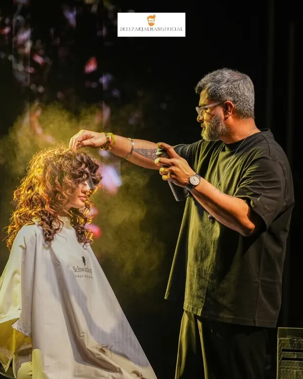 This is the moment where artistry takes over. On stage, I focus on demonstrating not just the 'how' but the 'why' behind each technique, like creating texture and volume for this runway-ready curly style at the Schwarzkopf Professional Lived-In Show.