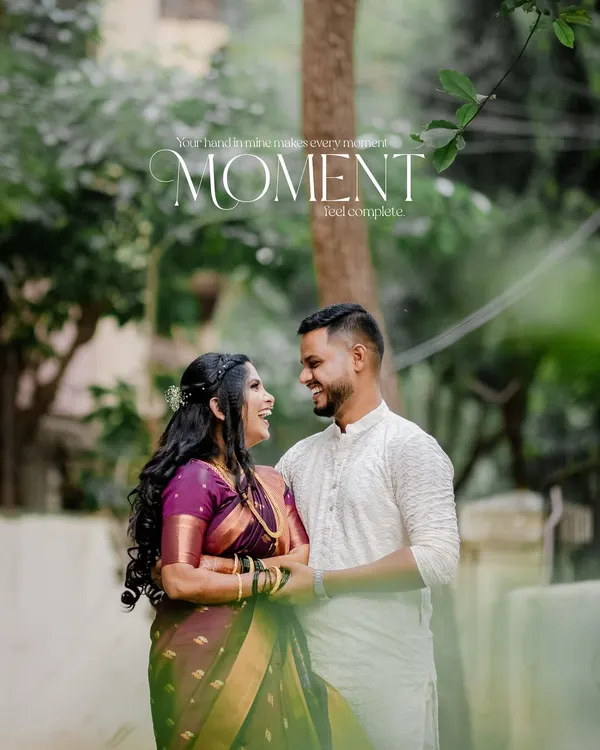A candid, romantic portrait of a couple sharing a look of love, framed by lush greenery. I use natural elements to create a soft, intimate feel for my couple photoshoots.