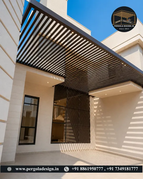 This cantilevered carport features a sleek, louvered design that extends from the home, creating a seamless and modern look. The all-black steel frame provides a bold architectural element while offering effective sun and rain protection for the vehicle parked below.
