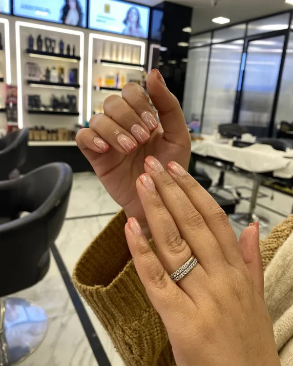 A beautiful and soft ombré design on natural nails, showing that you can have an elegant gradient effect without extensions.