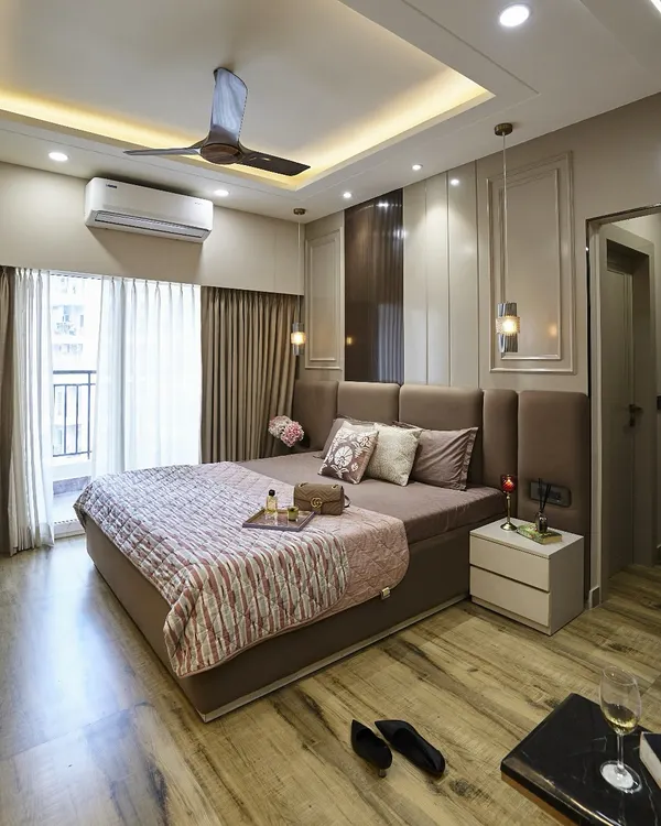 A master suite designed to feel like a five-star escape. I used a combination of wood-look flooring, wall paneling with moulding, and a plush upholstered bed to create a space that is both luxurious and comfortable.