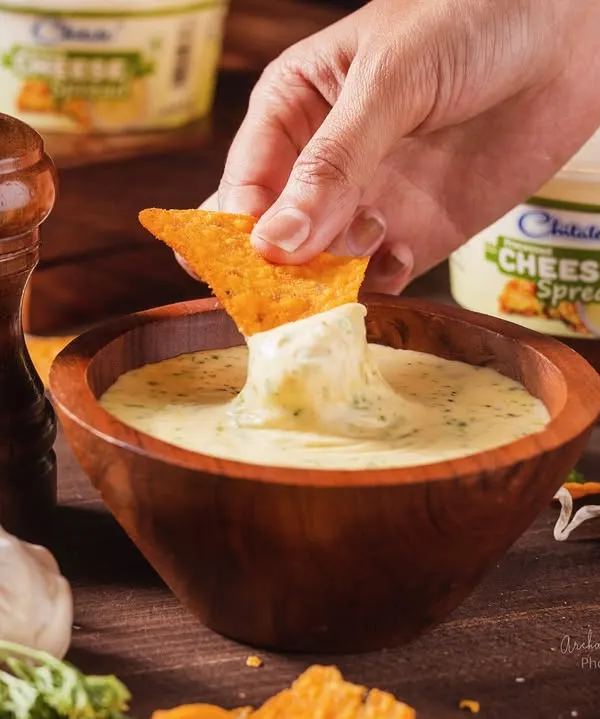 A perfectly captured moment for Chitale Bandhu, showing the rich, creamy texture of their cheese spread. I focus on creating action shots like this that are not just seen but felt, making you crave the product instantly. This is what professional food styling and photography can do for your brand.