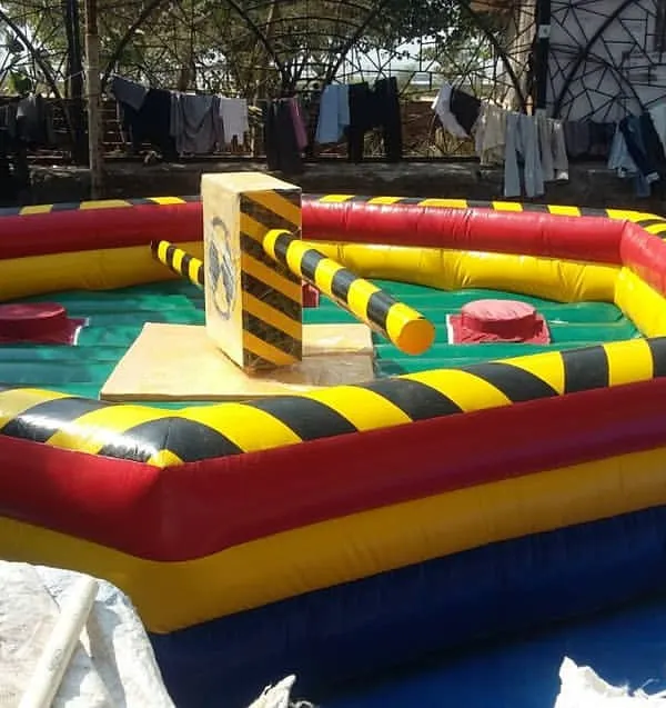 The Eliminator inflatable game is one of our most popular active rentals. I set up this large, contained arena where participants test their agility against rotating arms.