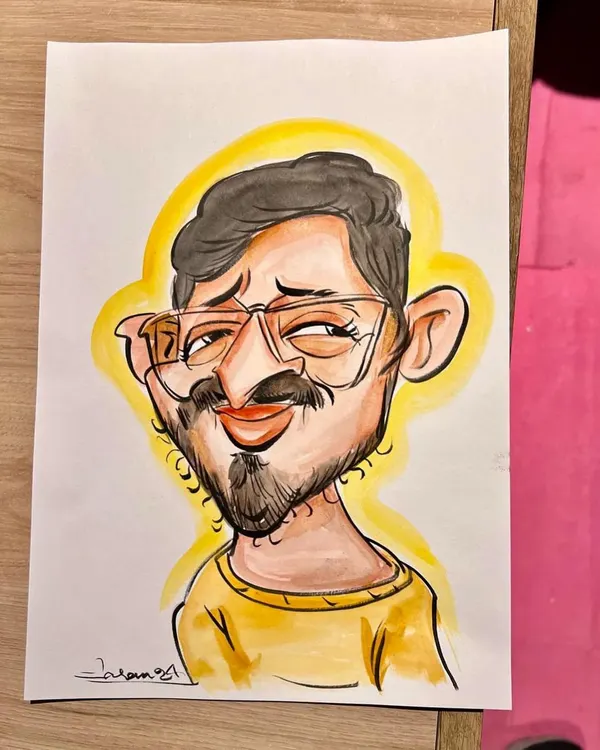 A finished colorful caricature, ready to be gifted. The yellow background makes the portrait pop, and the watercolor adds a soft, vibrant texture to the artwork.