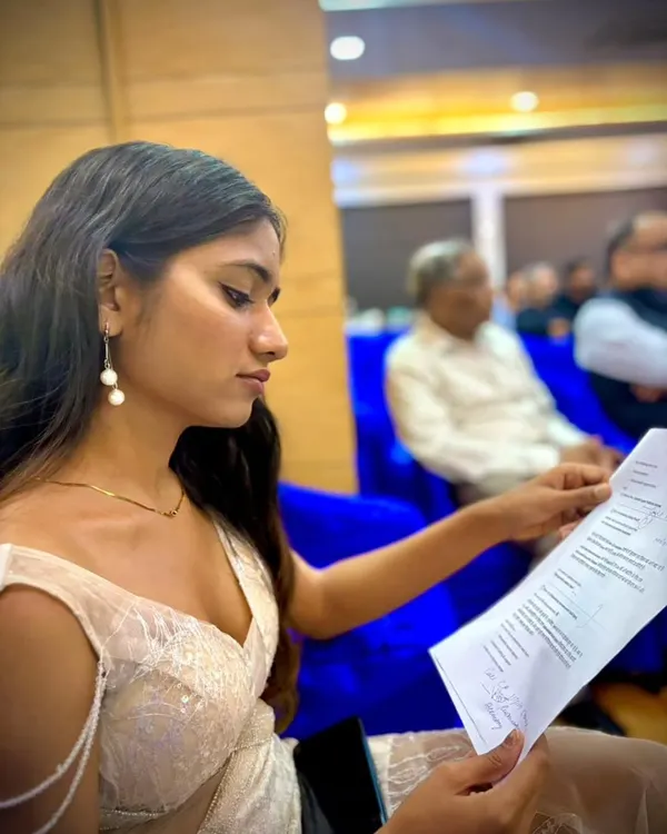 A quiet moment before the show begins. I believe thorough preparation is the key to a flawless event, so I always take the time to go over my script and cues. This focus ensures I can deliver with confidence and impact.
