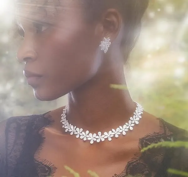A dreamy, atmospheric shot for Renu Oberoi Luxury Jewellery. We used light flares and a soft focus to create an enchanted forest feel, making the diamond necklace appear magical.