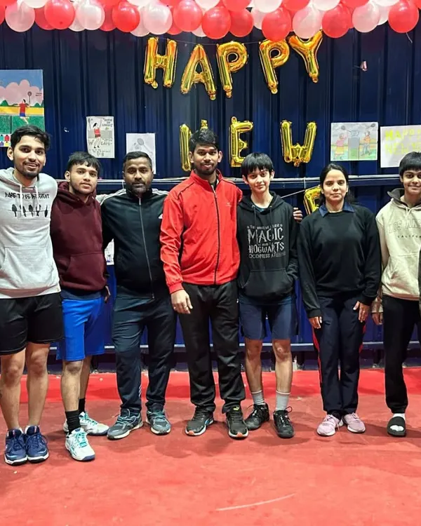 The AKS family celebrating the New Year together at the academy. We believe in building strong bonds off the court as well.