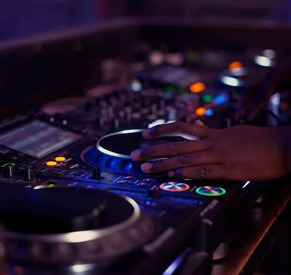 A close-up of the jog wheel on a Pioneer CDJ, a key tool for scratching and beatmatching. You'll get comfortable with this gear until it feels like an extension of your hands.