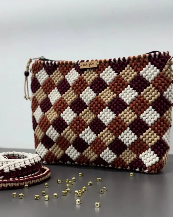 This checkered pattern is a customer favorite! This one features a beautiful mix of earthy tones like maroon, brown, and beige.