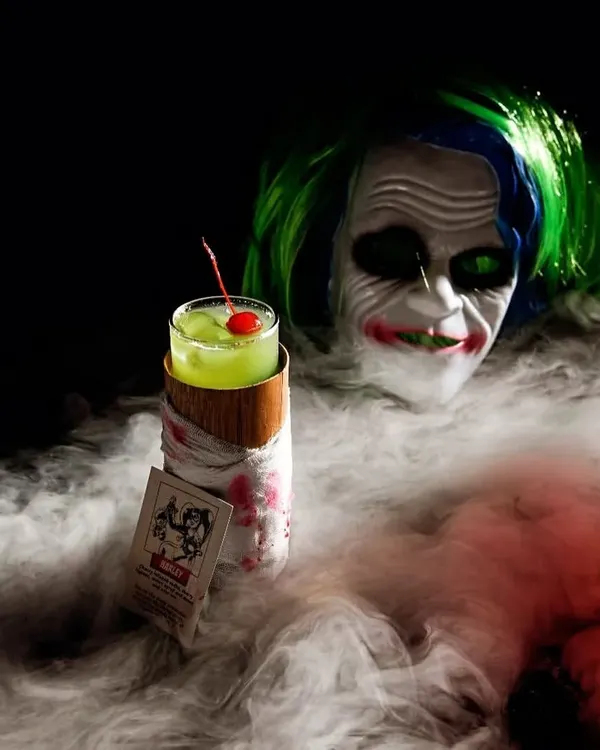 Halloween is a great opportunity to get creative. This spooky green cocktail, served with a Joker mask and dry ice, is sure to be a conversation starter.