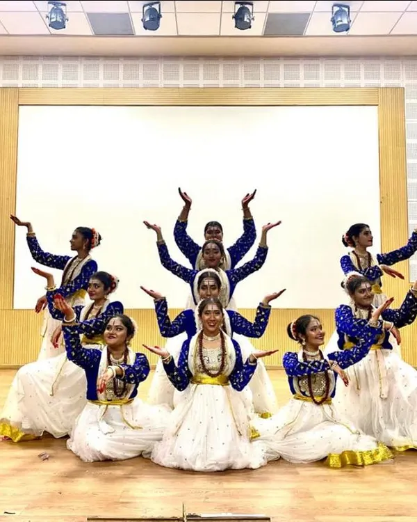 A proud moment! The DPS school dance team looking absolutely stunning in my white and blue classical dance costumes. Their synchronized pose shows how the outfits create a beautiful, unified look on stage.