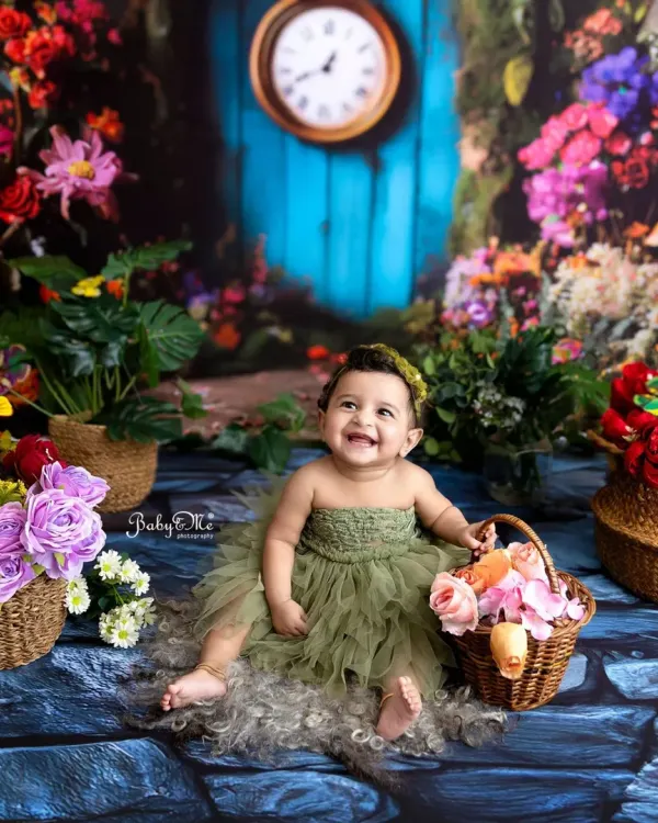 The happiest little fairy in the enchanted garden. Her joyful smile is absolutely contagious in this colorful and magical photoshoot setup.