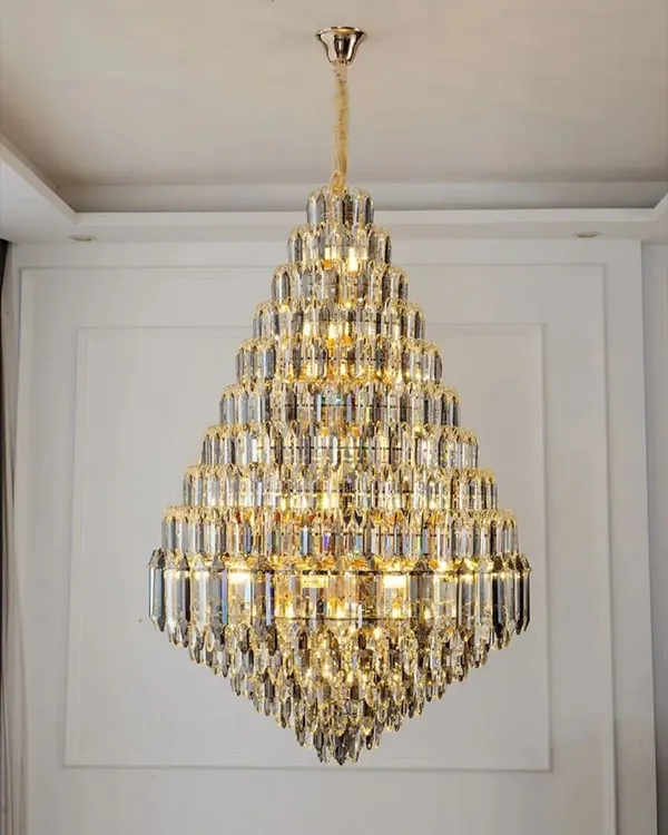 This diamond-shaped crystal chandelier is a modern marvel, constructed with high-quality K4 crystal for maximum brilliance. It is specifically designed as a double-height fixture, perfect for making a grand statement in a modern home's entryway.