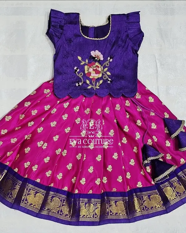 This newborn Pattu Pavadai in purple and pink is ready to dispatch. It's designed to be used for up to 2.5 years, thanks to the extra margins.