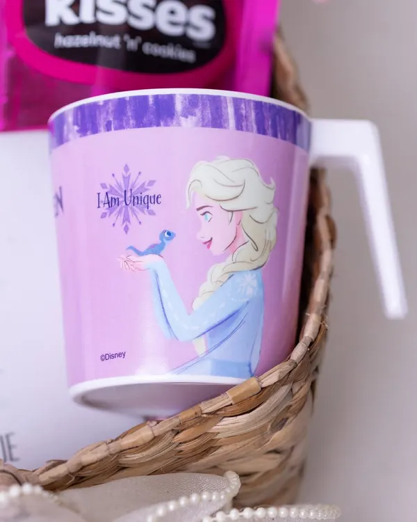 A close-up of a Disney 'Frozen' themed mug included in a birthday basket for a little girl. I love finding items that feature their favorite characters.