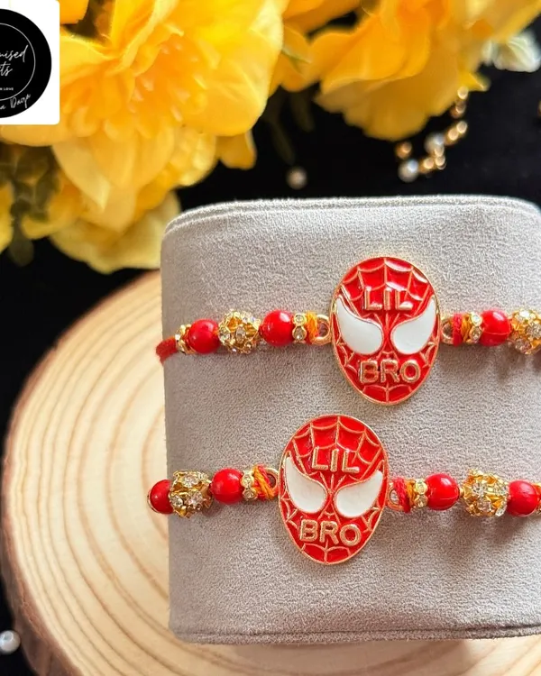 For your 'Lil Bro' who is a superhero in the making. This Spiderman-themed rakhi is sure to be a hit with its iconic mask design and vibrant red color.