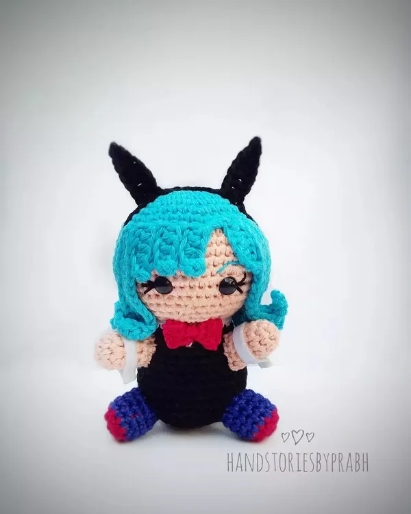 Here is my handmade version of Bulma from Dragon Ball Z in her bunny girl outfit. This was a custom order, and I had fun with her bright blue hair and cute accessories.