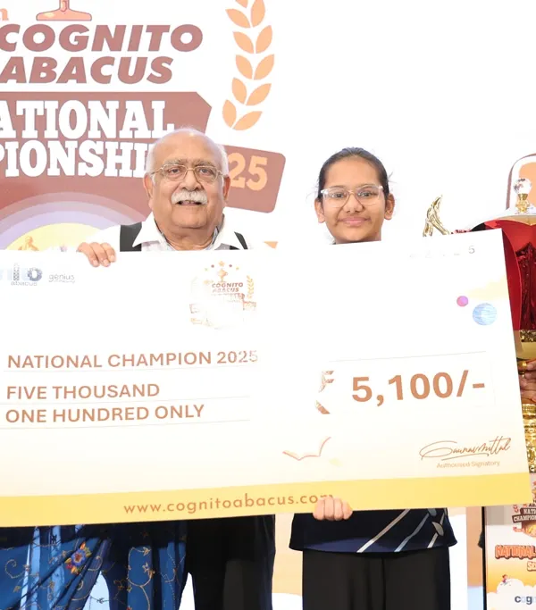 We celebrate every winner. Here, our Senior National Champion from the 2025 competition receives her award. This moment represents the culmination of focus, practice, and the ability to perform under pressure.