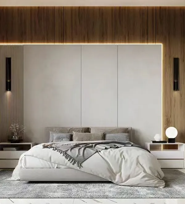 A serene and minimalist bedroom design featuring a wood-paneled accent wall with integrated strip lighting. The low-profile bed and simple side tables create a clean, uncluttered space perfect for relaxation.