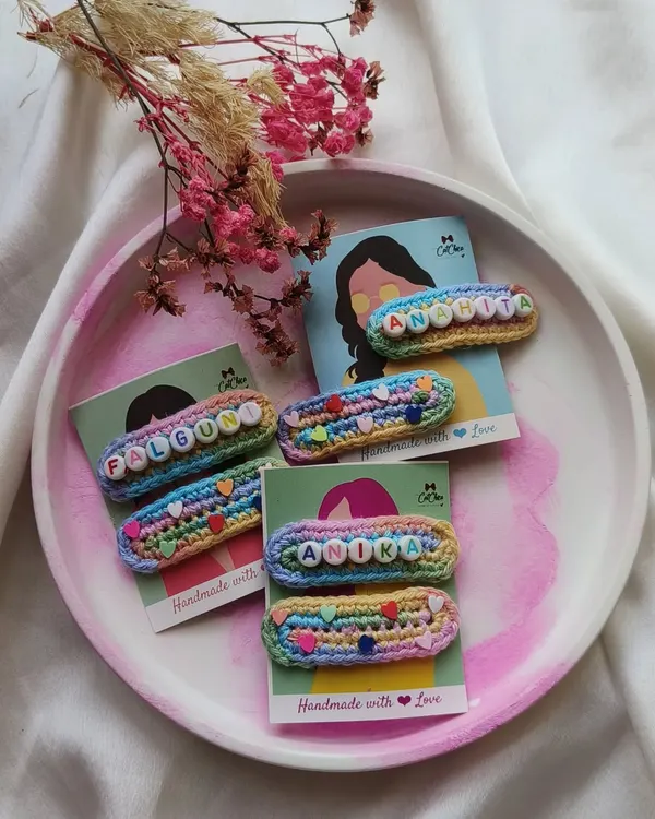 A beautiful set of our unicorn-themed name pop-up clips, ready to be gifted. We use a rainbow crochet base and add the name with letter beads for a fun, personalized touch.
