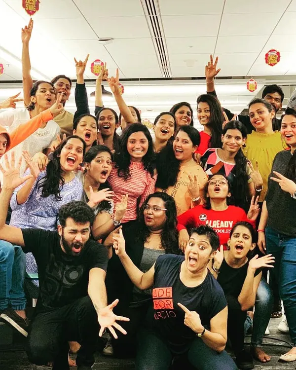 The pure, unfiltered joy after a corporate Zumba session. This photo captures the electric atmosphere and happy faces from our dance party at the Amazon Bangalore office. This is what successful employee engagement looks like.