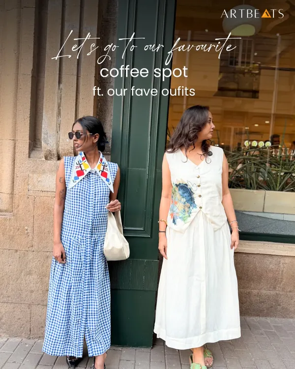 A coffee date featuring two of my favorite outfits. On the left, the Primary Gingham Maxi dress in handloom Bengal cotton with a hand-detailed art collar. On the right, the Reverie Co-ord Set in fine cotton linen, a perfect example of versatile, art-inspired dressing.
