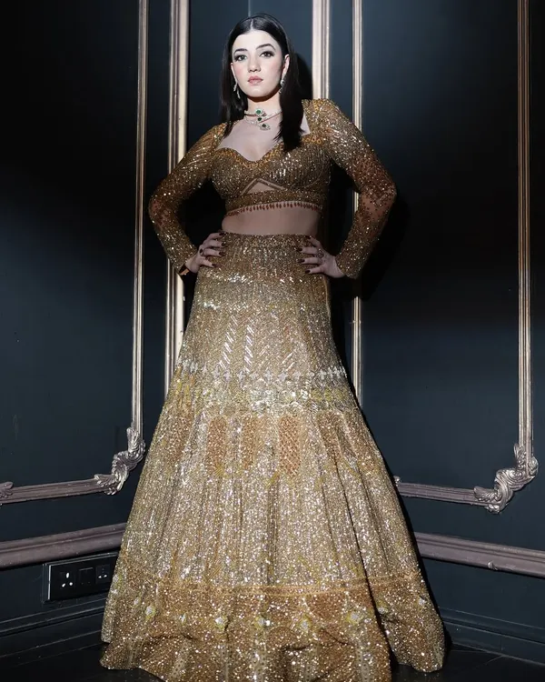 An ethereal vision draped in gold for a campaign shoot. We created a look with radiant, softly lit skin and bold smoky lids for a touch of drama.