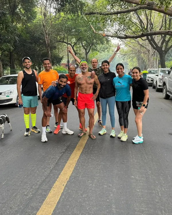 A typical post-run moment with the tribe. We are a small but impactful community dedicated to spreading the joy of running across Delhi.