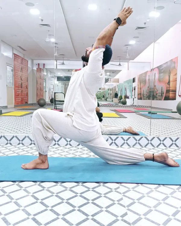 The Equestrian Pose (Ashwa Sanchalanasana) is a powerful lunge that strengthens the legs, stretches the hips, and improves balance. It's also therapeutic for relieving sciatica pain.