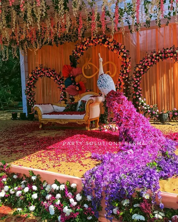 I believe every wedding should be a fairytale. This magnificent peacock, with its cascading tail of purple and pink flowers, was the centerpiece of a truly magical Mehendi ceremony, creating a spectacular photo backdrop and leaving guests in awe.