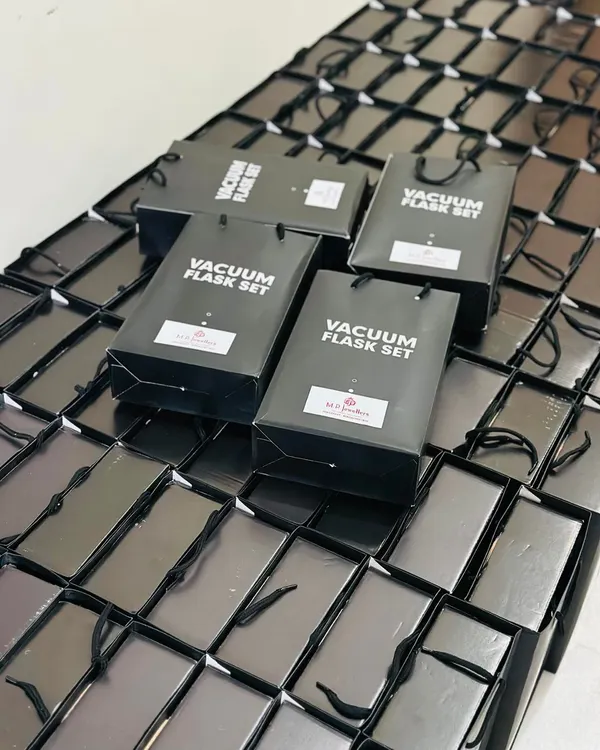 A large-scale corporate order of vacuum flask sets, neatly arranged and ready for dispatch. This image highlights our capability in handling logistics for high-volume gifting projects.